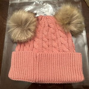 New in packaging. Ladies Pink Double Puff Beanie. Please make your best offer.